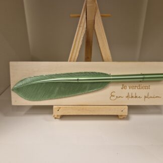 Houten bordje met groene pen
